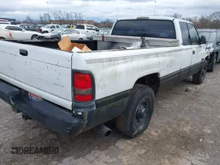 1996 Dodge Ram 2500 with VIN 3B7KC23CXTM147915, listed as a IAAI auction lot 41236310 with 211,518 mi miles. Bid and sale history available at carsss.com. Image 4.