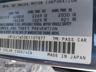 2014 Mazda 6 i Grand Touring with VIN JM1GJ1W50E1107877, listed as a IAAI auction lot 41857596 with 166,188 mi miles and . Bid and sale history available at DreamBid. Image 9.