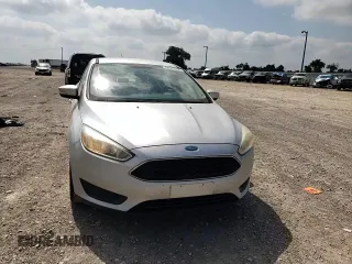 2015 Ford Focus SE z VIN 1FADP3F22FL343834, wystawiony jako Copart lot #58076265 z przebiegiem 101 891 mil mil oraz Szkoda całkowita • Salvage title. Historia ofert i sprzedaży dostępna na DreamBid. Obrazek 13.