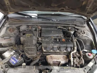 2004 Honda Civic LX with VIN 2HGES165X4H517818, listed as a IAAI auction lot 42164416 with 164,918 mi miles and . Bid and sale history available at carsss.com. Image 10.