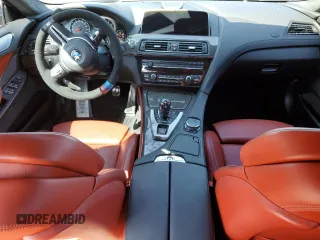 2016 BMW M6 z VIN WBS6E9C56GGF92508, wystawiony jako Copart lot #66958344 z przebiegiem Nie podano mil oraz Szkoda całkowita • Salvage title. Historia ofert i sprzedaży dostępna na DreamBid. Obrazek 8.