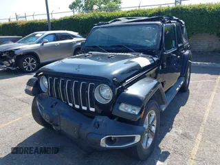 2018 Jeep Wrangler Unlimited Sahara with VIN 1C4HJXEN7JW328981, listed as a IAAI auction lot 42217508 with 59,584 mi miles and . Bid and sale history available at DreamBid. Image 6.