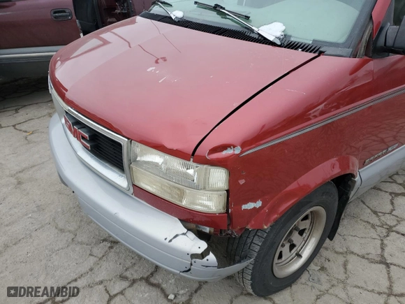 1997 GMC Safari Passenger with VIN 1GKEL19WXVB530471, listed as a Copart auction lot 86403504 with 0 mi miles and Salvage Title. Bid and sale history available at carsss.com. Image 12.