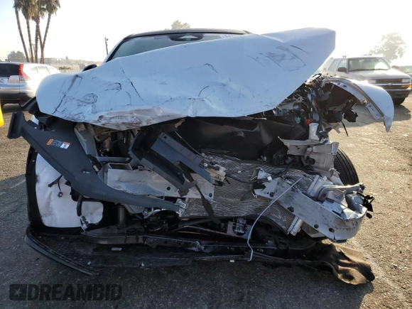 2022 Ford Mustang Mach-E Premium z VIN 3FMTK3R79NMA24032, wystawiony jako Copart lot #64334882 z przebiegiem Nie podano mil oraz . Historia ofert i sprzedaży dostępna na DreamBid. Obrazek 9.