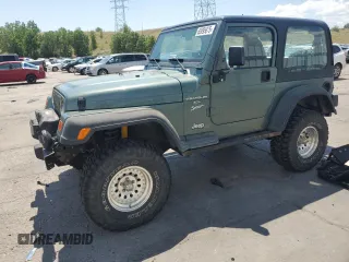 2000 Jeep Wrangler Sport with VIN 1J4FA49S4YP710633, listed as a Copart auction lot 65095875 with 107,613 mi miles and Clean title. Bid and sale history available at DreamBid. Image 1.