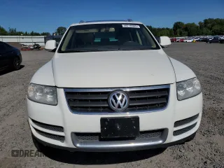 2008 Volkswagen Touareg V6 z VIN WVGBE77L68D012544, wystawiony jako Copart lot #58716985 z przebiegiem 148 637 mil mil oraz Czysty tytuł • Clean title. Historia ofert i sprzedaży dostępna na DreamBid. Obrazek 5.