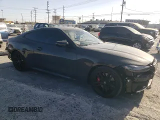 2024 BMW 4 Series M440i with VIN WBA83AP01RCP30000, listed as a Copart auction lot 77032014 with 14,671 mi miles and Salvage Title. Bid and sale history available at carsss.com. Image 4.