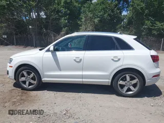 2015 Audi Q3 Premium Plus z VIN WA1EFCFS7FR012210, wystawiony jako IAAI lot #42771683 z przebiegiem 229 799 mil mil oraz . Historia ofert i sprzedaży dostępna na DreamBid. Obrazek 14.