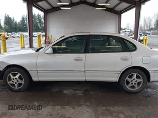 1998 Toyota Avalon XL with VIN 4T1BF18B5WU242038, listed as a IAAI auction lot 41577342 with 195,707 mi miles and . Bid and sale history available at DreamBid. Image 14.