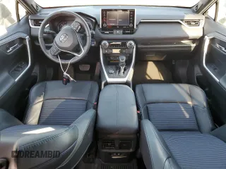 2021 Toyota RAV4 Hybrid XSE with VIN 2T3E6RFV1MW018990, listed as a Copart auction lot 64043865 with 55,938 mi miles and Salvage title. Bid and sale history available at DreamBid. Image 8.