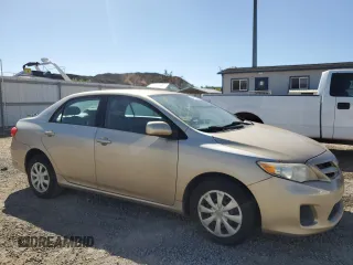 2011 Toyota Corolla L with VIN 2T1BU4EEXBC662749, listed as a Copart auction lot 84761994 with 66,697 mi miles and Salvage Title. Bid and sale history available at carsss.com. Image 4.