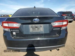 2021 Subaru Impreza Premium with VIN 4S3GKAD64M3602675, listed as a Copart auction lot 57650615 with 79,227 mi miles and Salvage title. Bid and sale history available at DreamBid. Image 6.