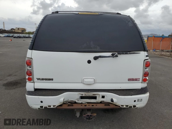 2005 GMC Yukon Denali z VIN 1GKEK63UX5J194771, wystawiony jako Copart lot #53170035 z przebiegiem 175 910 mil mil oraz Czysty tytuł • Clean title. Historia ofert i sprzedaży dostępna na DreamBid. Obrazek 6.