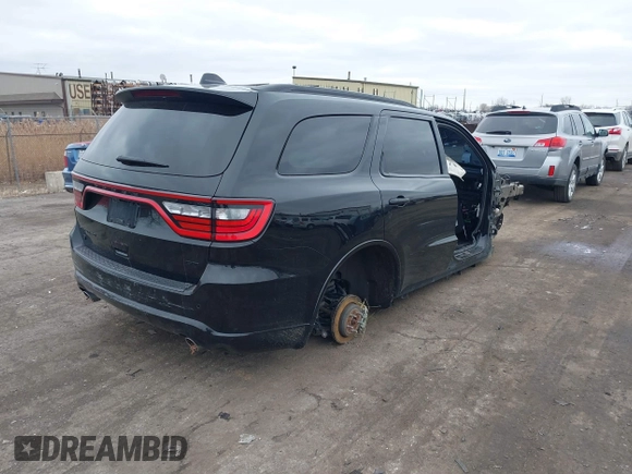 2021 Dodge Durango GT Plus with VIN 1C4RDJDGXMC697058, listed as a IAAI auction lot 41495605 with Not provided miles and . Bid and sale history available at DreamBid. Image 4.