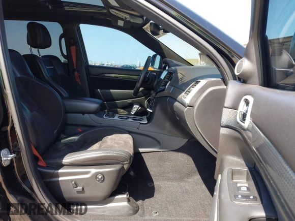2020 Jeep Grand Cherokee Trackhawk with VIN 1C4RJFN96LC336561, listed as a IAAI auction lot 41991800 with 58,781 mi miles and . Bid and sale history available at DreamBid. Image 5.