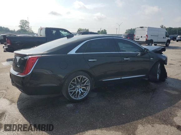 2018 Cadillac XTS Luxury with VIN 2G61N5S30J9164322, listed as a Copart auction lot 57048835 with 122,301 mi miles and Salvage title. Bid and sale history available at DreamBid. Image 3.
