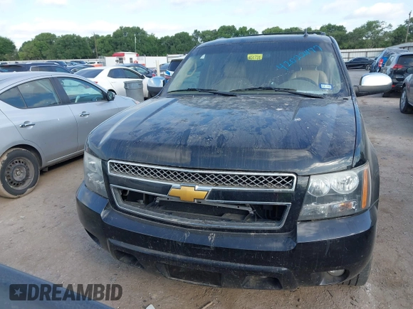 2014 Chevrolet Suburban LTZ with VIN 1GNSCKE08ER220808, listed as a IAAI auction lot 42022477 with 192,488 mi miles and . Bid and sale history available at DreamBid. Image 12.
