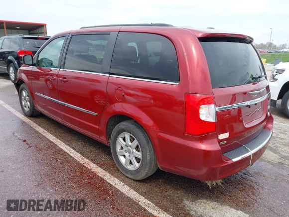 2012 Chrysler Town & Country Touring with VIN 2C4RC1BG8CR344068, listed as a IAAI auction lot 41970494 with 130,559 mi miles. Bid and sale history available at carsss.com. Image 3.