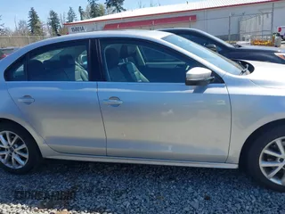 2013 Volkswagen Jetta SE z VIN 3VWDP7AJ0DM447943, wystawiony jako IAAI lot #42021858 z przebiegiem 127 083 mil mil oraz . Historia ofert i sprzedaży dostępna na DreamBid. Obrazek 13.