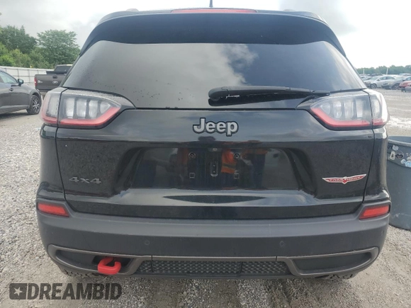 2019 Jeep Cherokee Trailhawk with VIN 1C4PJMBX9KD183116, listed as a Copart auction lot 58518265 with 124,258 mi miles and Salvage title. Bid and sale history available at DreamBid. Image 6.