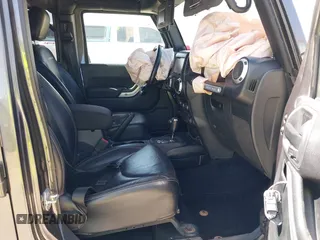 2014 Jeep Wrangler Unlimited Rubicon с VIN 1C4BJWFG2EL279938, выставлен на аукционе IAAI как лот 41920729 с пробегом 76 418 миль миль и . История ставок и продаж доступна на DreamBid. Изображение 5.