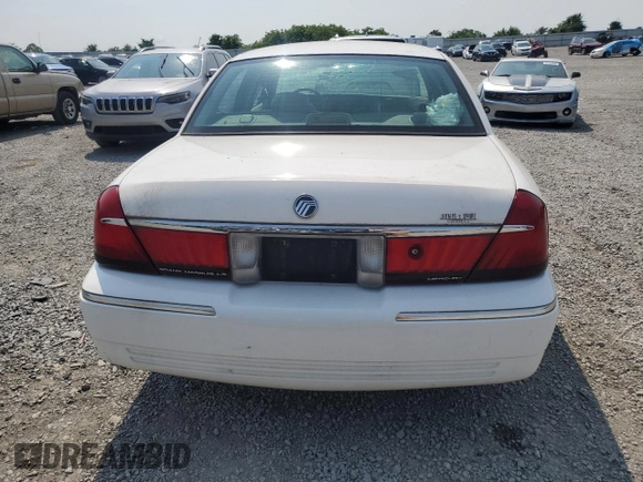 2002 Mercury Grand Marquis LS Premium z VIN 2MEFM75W52X666147, wystawiony jako Copart lot #58970815 z przebiegiem 133 495 mil mil oraz Szkoda całkowita • Salvage title. Historia ofert i sprzedaży dostępna na DreamBid. Obrazek 6.