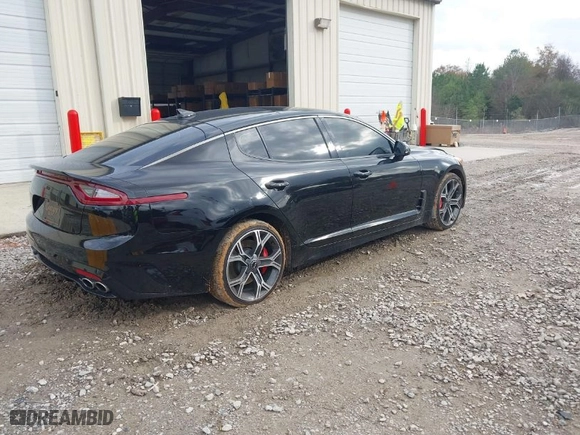 2019 Kia Stinger GT with VIN KNAE35LC7K6070754, listed as a IAAI auction lot 40960487 with 75,399 mi miles. Bid and sale history available at carsss.com. Image 4.