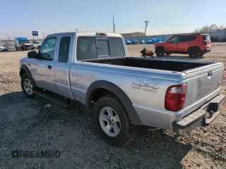 2002 Ford Ranger XL Fleet with VIN 1FTZR45E72PA98253, listed as a Copart auction lot 89013035 with 188,330 mi miles and Salvage Title. Bid and sale history available at DreamBid. Image 2.