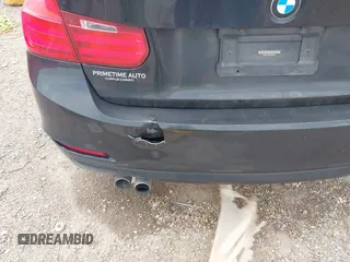 2015 BMW 3 Series 328i with VIN WBA3C1C5XFP852807, listed as a IAAI auction lot 42043565 with 120,048 mi miles and . Bid and sale history available at carsss.com. Image 6.