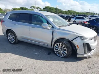 2020 Cadillac XT6 FWD Premium Luxury with VIN 1GYKPCRS7LZ164978, listed as a IAAI auction lot 41558920 with 87,416 mi miles. Bid and sale history available at carsss.com. Image 1.