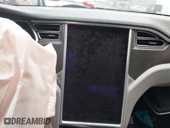 2014 Tesla Model S 60 with VIN 5YJSA1H18EFP30143, listed as a IAAI auction lot 42190505 with Not provided miles and . Bid and sale history available at DreamBid. Image 16.