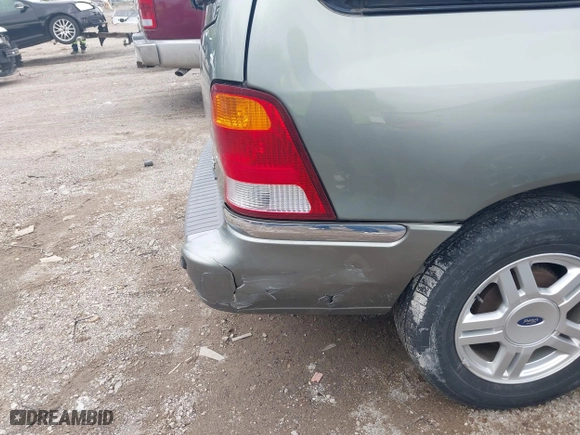 2003 Ford Windstar Wagon SE with VIN 2FMZA52483BB91134, listed as a IAAI auction lot 42094741 with 56,371 mi miles. Bid and sale history available at carsss.com. Image 6.