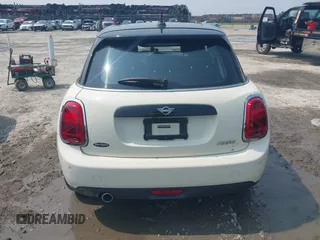 2020 MINI Hardtop 4 Door Cooper with VIN WMWXU7C01L2M54710, listed as a IAAI auction lot 42385956 with 55,714 mi miles and . Bid and sale history available at DreamBid. Image 16.
