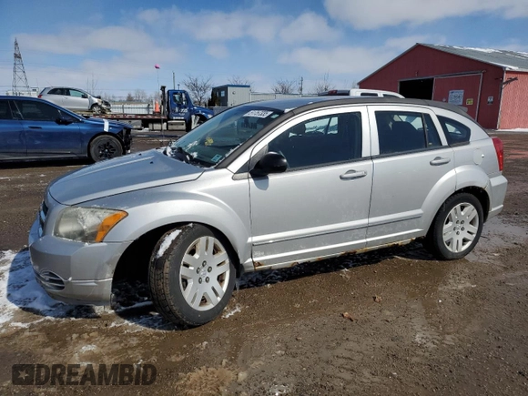 2010 Dodge Caliber SXT z VIN 1B3CB4HA4AD597158, wystawiony jako Copart lot #51757335 z przebiegiem 128 791 mil mil oraz Czysty tytuł • Clean title. Historia ofert i sprzedaży dostępna na DreamBid. Obrazek 1.