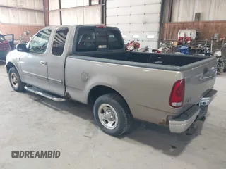 2001 Ford F-150 XL z VIN 1FTZX17241NB44865, wystawiony jako IAAI lot #42033863 z przebiegiem 145 072 mil mil oraz . Historia ofert i sprzedaży dostępna na DreamBid. Obrazek 3.
