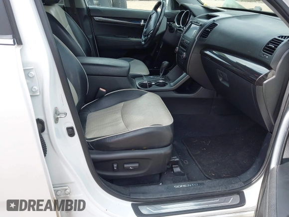 2012 Kia Sorento SX z VIN 5XYKWDA23CG231228, wystawiony jako IAAI lot #42366536 z przebiegiem 154 627 mil mil oraz . Historia ofert i sprzedaży dostępna na DreamBid. Obrazek 5.