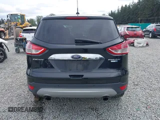 2014 Ford Escape Titanium with VIN 1FMCU9J95EUD60587, listed as a IAAI auction lot 42129854 with 155,559 mi miles and . Bid and sale history available at DreamBid. Image 16.