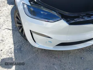 2023 Tesla Model X with VIN 7SAXCDE54PF430808, listed as a IAAI auction lot 41667924 with 21,100 mi miles and . Bid and sale history available at DreamBid. Image 6.
