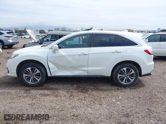 2017 Acura RDX Advance with VIN 5J8TB3H70HL001087, listed as a IAAI auction lot 41799341 with 125,205 mi miles and . Bid and sale history available at DreamBid. Image 14.