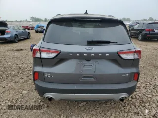 2021 Ford Escape SE with VIN 1FMCU9G64MUB16148, listed as a Copart auction lot 60994595 with 7,772 mi miles and Salvage title. Bid and sale history available at DreamBid. Image 6.
