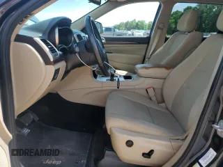 2014 Jeep Grand Cherokee Laredo with VIN 1C4RJEAGXEC160132, listed as a Copart auction lot 55599615 with 127,541 mi miles and Clean Title. Bid and sale history available at DreamBid. Image 7.