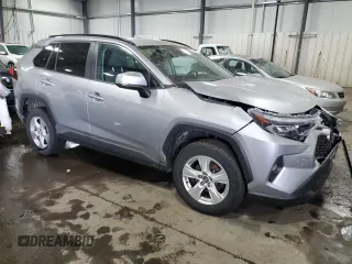2020 Toyota RAV4 XLE with VIN 2T3P1RFV9LC101638, listed as a Copart auction lot 49167915 with 86,111 mi miles and Salvage Title. Bid and sale history available at DreamBid. Image 4.