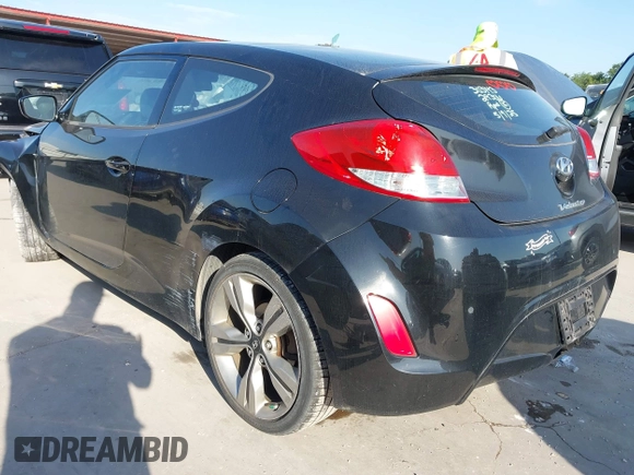2013 Hyundai Veloster w/Black Int with VIN KMHTC6AD2DU171044, listed as a IAAI auction lot 42245907 with 140,542 mi miles and . Bid and sale history available at DreamBid. Image 3.