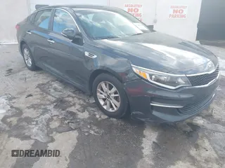 2016 Kia Optima LX z VIN 5XXGT4L34GG020666, wystawiony jako IAAI lot #41406265 z przebiegiem 173 645 mil mil oraz . Historia ofert i sprzedaży dostępna na DreamBid. Obrazek 1.