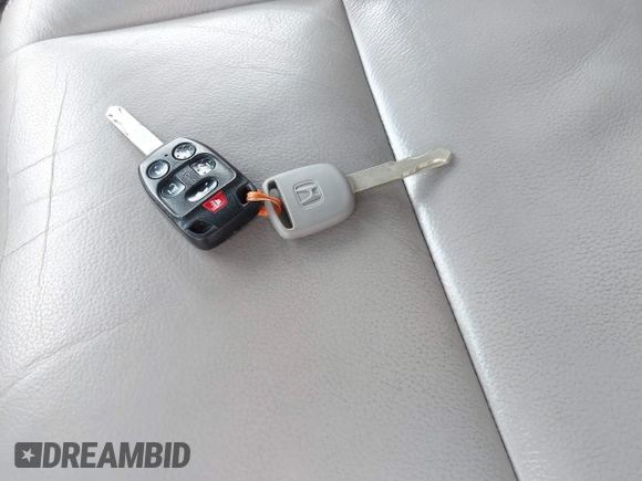 2012 Honda Odyssey EX-L с VIN 5FNRL5H61CB070536, выставлен на аукционе IAAI как лот 42246934 с пробегом 239 930 миль миль и . История ставок и продаж доступна на DreamBid. Изображение 11.