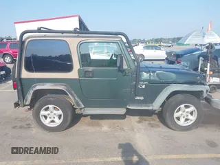 2002 Jeep Wrangler X with VIN 1J4FA39S72P733034, listed as a IAAI auction lot 42659447 with 200,786 mi miles and . Bid and sale history available at DreamBid. Image 13.
