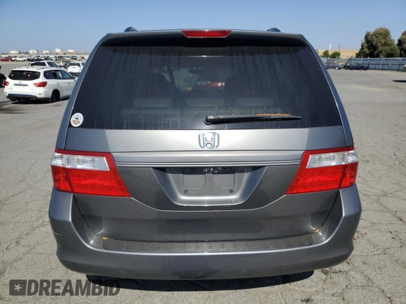 2007 Honda Odyssey EX-L z VIN 5FNRL38677B424117, wystawiony jako Copart lot #58814235 z przebiegiem 188 908 mil mil oraz Szkoda całkowita • Salvage title. Historia ofert i sprzedaży dostępna na DreamBid. Obrazek 6.