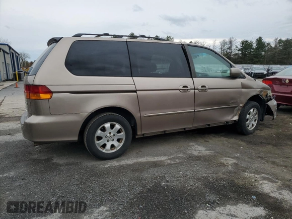 2003 Honda Odyssey EX-L z VIN 5FNRL18053B103431, wystawiony jako Copart lot #52580715 z przebiegiem Nie podano mil oraz Szkoda całkowita • Salvage title. Historia ofert i sprzedaży dostępna na DreamBid. Obrazek 3.