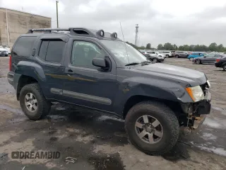 2012 Nissan Xterra X with VIN 5N1AN0NW0CC503500, listed as a Copart auction lot 71752364 with 139,892 mi miles and Salvage Title. Bid and sale history available at DreamBid. Image 4.