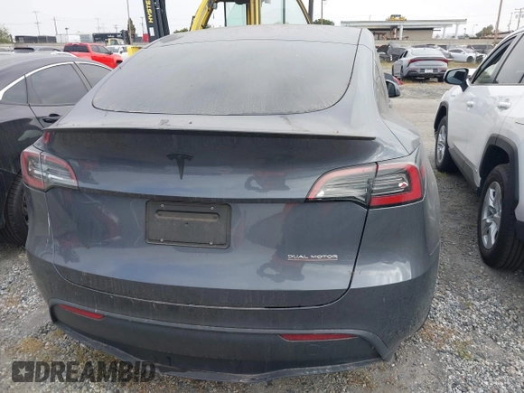 2023 Tesla Model Y Performance z VIN 7SAYGDEF6PF774965, wystawiony jako IAAI lot #41655550 z przebiegiem 33 824 mil mil oraz . Historia ofert i sprzedaży dostępna na DreamBid. Obrazek 16.